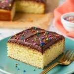Classic Vanilla Cake Topped with Rich Chocolate Frosting